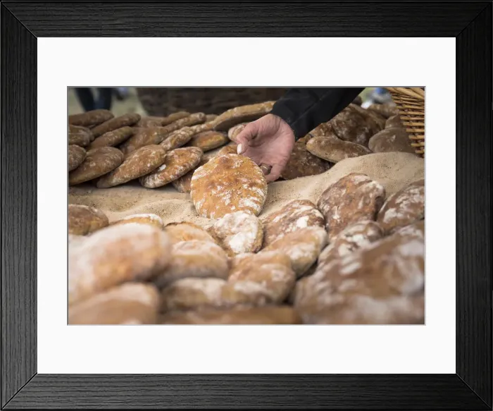 Framed Print : a basket full of schAottelbrot, the typical south tyrolean bread, bolzano