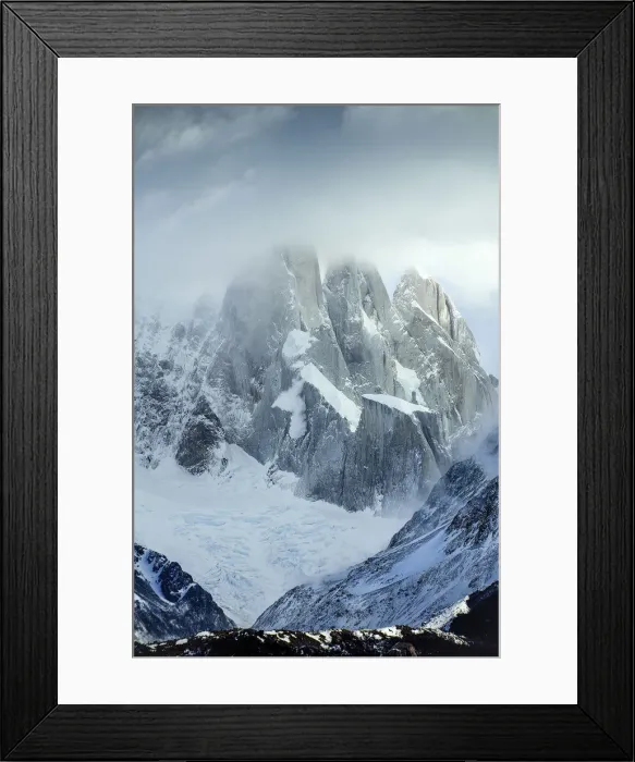Framed Print : The Cerro Torre Mountain into the clouds taken near Laguna Torre into the Glacier