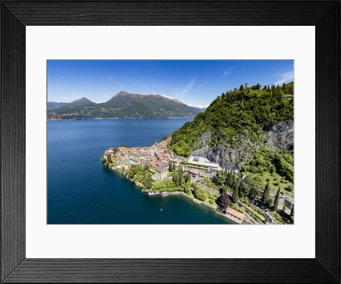 Framed Print : Aerial view of the picturesque village of Varenna overlooking the blue waters of Lake Framed Print : Aerial view of the picturesque village of Varenna overlooking the blue waters of Lake