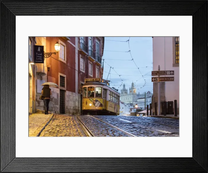 Framed Print : Romantic atmosphere in the old streets of Alfama with the castle in the background Framed Print : Romantic atmosphere in the old streets of Alfama with the castle in the background
