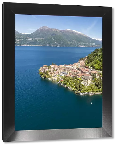 Aerial view of the village of Varenna frames by the blue water of Lake Como Lecco