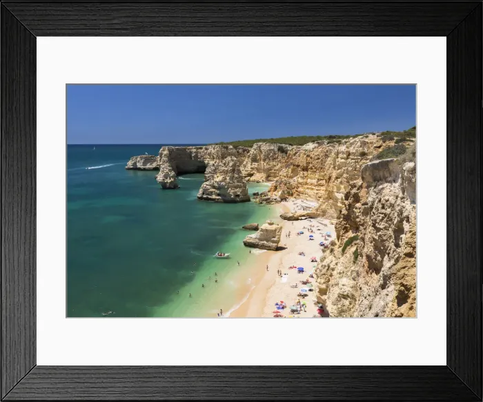 Framed Print : Top view of cliffs and turquoise water of the ocean Praia da Marinha Caramujeira Lagoa Framed Print : Top view of cliffs and turquoise water of the ocean Praia da Marinha Caramujeira Lagoa