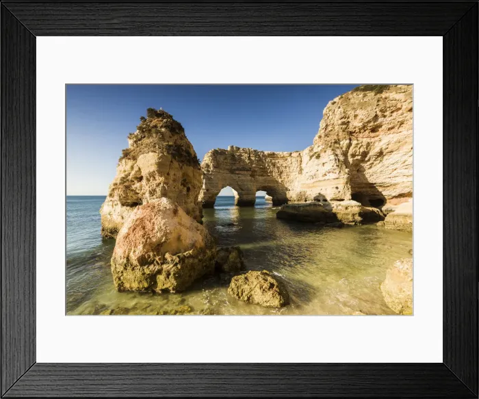 Framed Print : Sunrise on the cliffs and turquoise water of the ocean Praia da Marinha Caramujeira Framed Print : Sunrise on the cliffs and turquoise water of the ocean Praia da Marinha Caramujeira