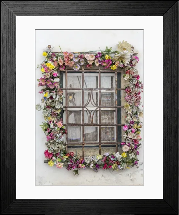 Framed Print : A window adorned with colorful flowers in the ancient fortified town of Obidos Oeste