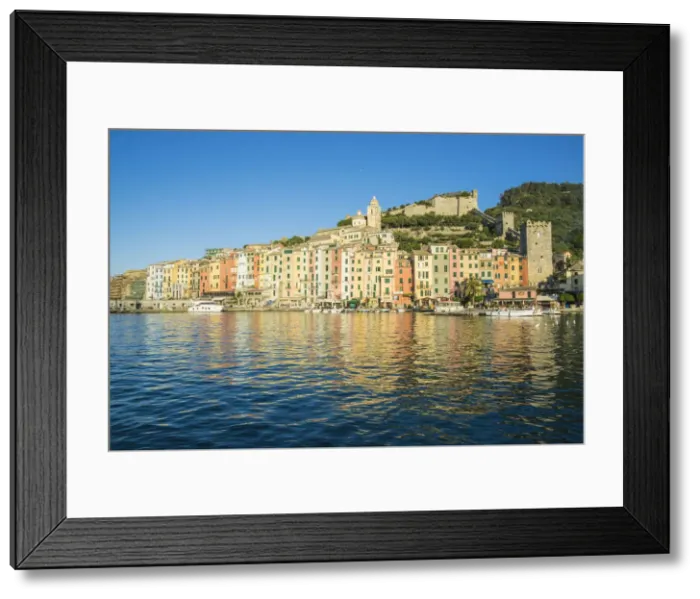 Framed Print : The blue sea frames the typical colored houses of Portovenere La Spezia province Liguria Framed Print : The blue sea frames the typical colored houses of Portovenere La Spezia province Liguria
