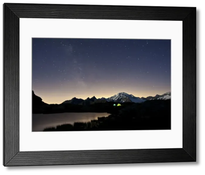 Framed Print : The Milky Way creates a magical atmosphere in a starry sky made clear by the wind Framed Print : The Milky Way creates a magical atmosphere in a starry sky made clear by the wind