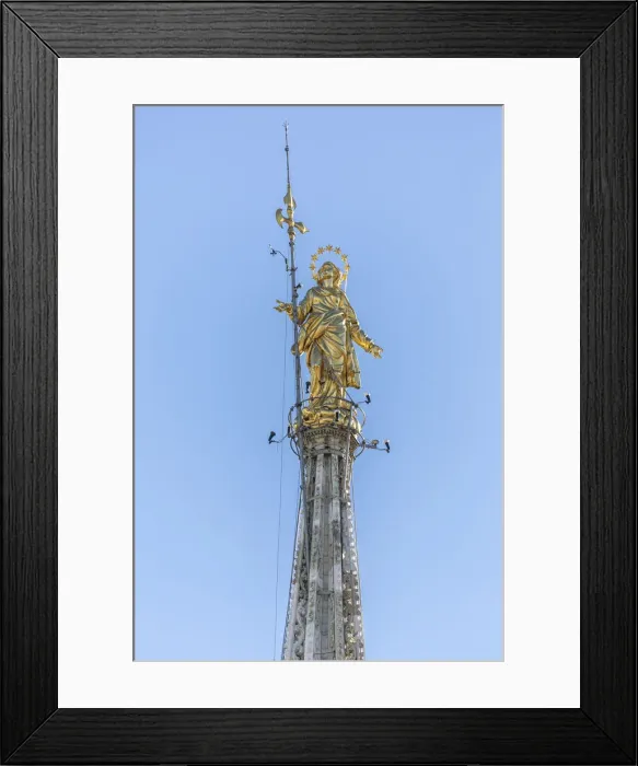 Framed Print : The golden statue called La Madonnina on the top of the Duomo the icon of Milan Lombardy Framed Print : The golden statue called La Madonnina on the top of the Duomo the icon of Milan Lombardy