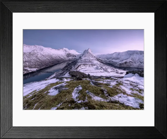 Framed Print : The snowy peaks above the frozen sea framed by the soft lights of dusk Gryllefjorden Framed Print : The snowy peaks above the frozen sea framed by the soft lights of dusk Gryllefjorden