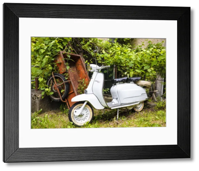 Framed Print : Two-seater Lambretta Innocenti scooter in a courtyard, Morbegno, province of Sondrio Framed Print : Two-seater Lambretta Innocenti scooter in a courtyard, Morbegno, province of Sondrio