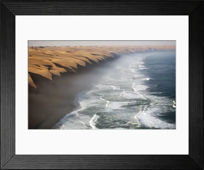 Framed Print : The waves of the Atlantic Ocean crashing against the sandy wall of the Namib desert Framed Print : The waves of the Atlantic Ocean crashing against the sandy wall of the Namib desert