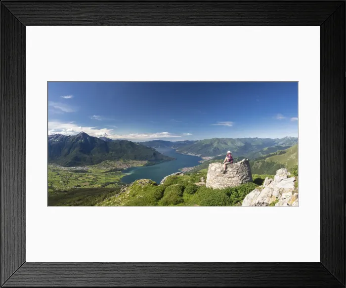 Framed Print : Panoramic of hiker on Monte Berlinghera looking to Colico, Monte Legnone and Monti Framed Print : Panoramic of hiker on Monte Berlinghera looking to Colico, Monte Legnone and Monti