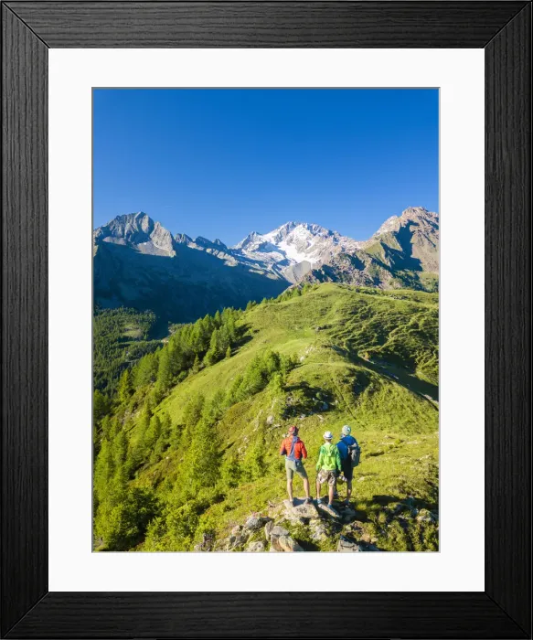 Framed Print : Hikers look towards Monte Disgrazia from Scermendone Alp, Sondrio province, Valtellina
