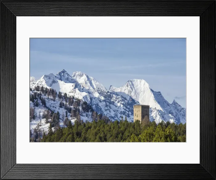 Framed Print : The Belvedere Tower frames the snowy peaks and Peak Badile on a spring day Maloja Framed Print : The Belvedere Tower frames the snowy peaks and Peak Badile on a spring day Maloja