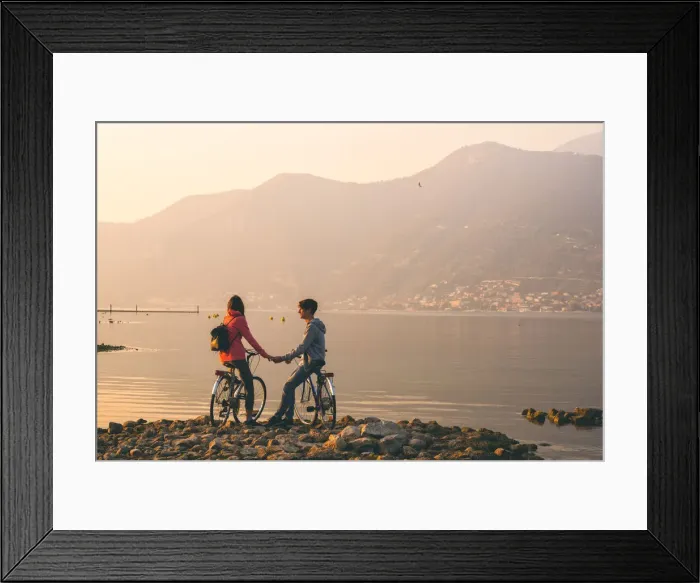 Framed Print : Pair of cyclists at sunset, iseo lake, Brescia province, Lombardy district, Italy Framed Print : Pair of cyclists at sunset, iseo lake, Brescia province, Lombardy district, Italy