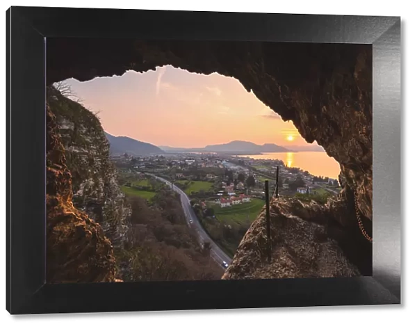 Iseo seen from a cave at sunset, Iseo lake, Lombardy district, Brescia province, Italy