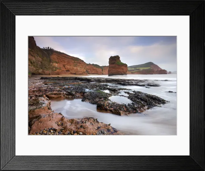 Framed Print : Otterton sandstone cliffs and seastacks at Ladram Bay, South Devon, England. January 2009 Framed Print : Otterton sandstone cliffs and seastacks at Ladram Bay, South Devon, England. January 2009