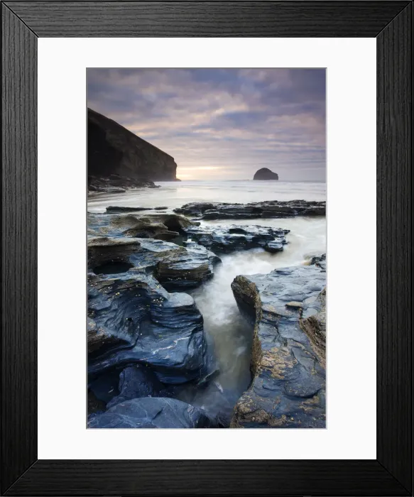 Framed Print : Eroded slate rocks on the beach at Trebarwith Strand, looking towards Gull Rock Framed Print : Eroded slate rocks on the beach at Trebarwith Strand, looking towards Gull Rock