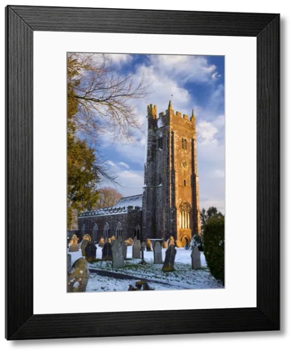 Framed Print : St Marys Church, Morchard Bishop bathed in afternoon sunshine on a snowy winter