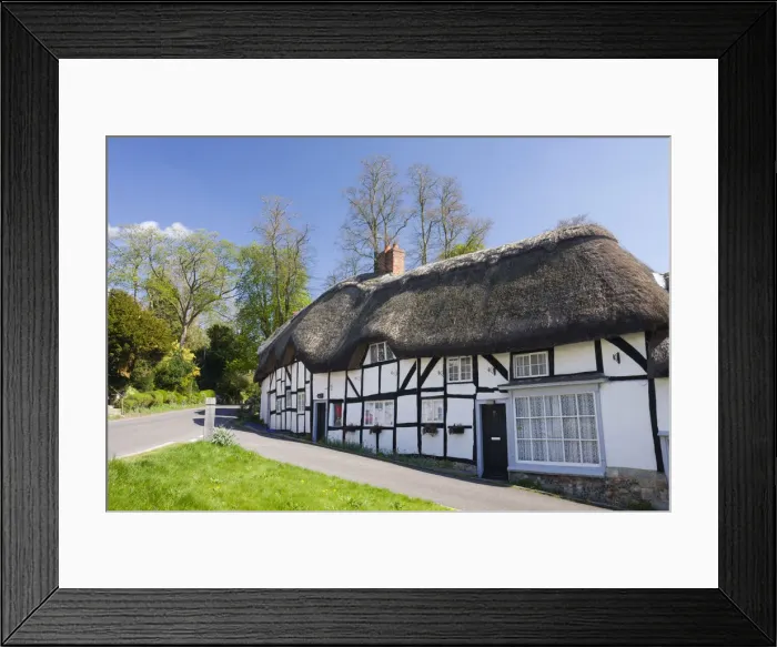 Framed Print : Thatched cottages in the village of Wherwell, Hampshire, England. Spring (April) 2009 Framed Print : Thatched cottages in the village of Wherwell, Hampshire, England. Spring (April) 2009