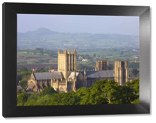 Wells Cathedral and Glastonbury Tor on a misty Spring morning, Wells, Somerset, England