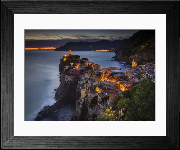 Framed Print : Vernazza, Liguria, Italy. View of the village during sunset, with trees on the foreground Framed Print : Vernazza, Liguria, Italy. View of the village during sunset, with trees on the foreground