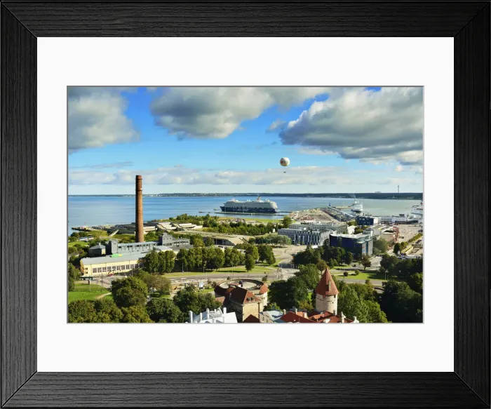 Framed Print : Tallinns Old Town and a cruise ship at Linnahall Harbour in the background. Tallinn