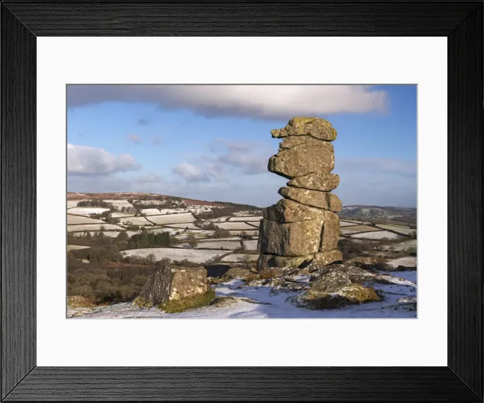 Framed Print : The Bowermans Nose granite pillar surrounded by some light winter snow, Dartmoor