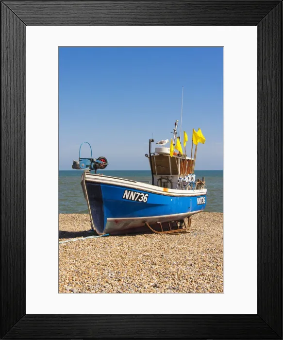 Framed Print : A traditional fishing boat on the shingle beach at Hastings, Sussex, England