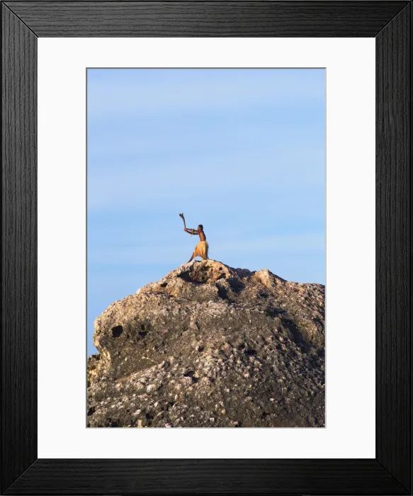 Framed Print : Warrior on rock, Kuata Island, Yasawa Islands, Fiji