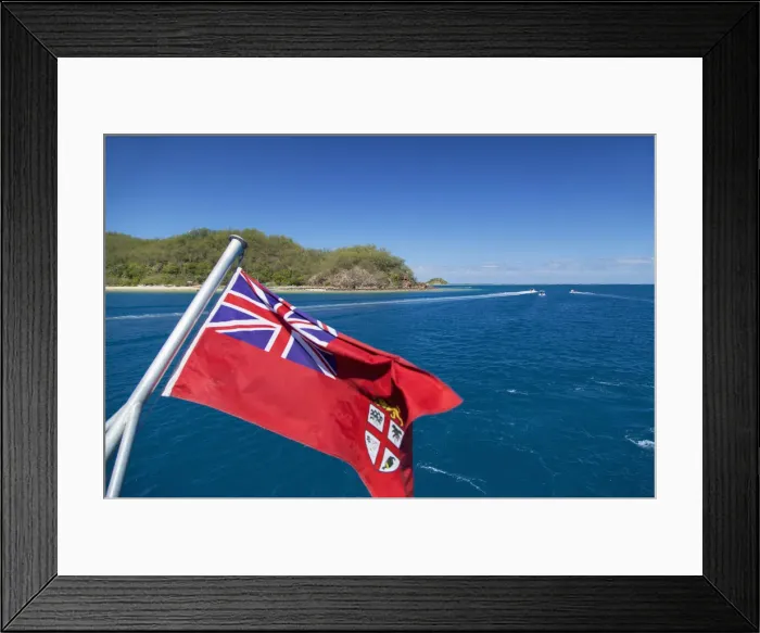 Framed Print : Fijian flag and Malolo Island, Mamanuca Islands, Fiji