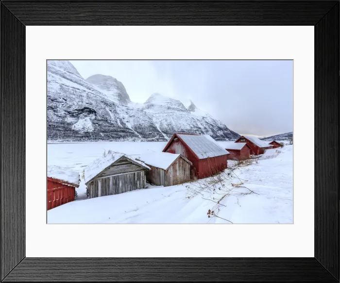 Framed Print : Typical wooden huts in the snowy landscape of Lyngseidet Lyngen Alps Tromsa¸ Lapland Norway Europe