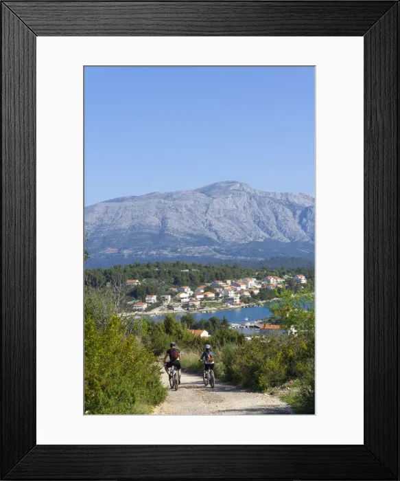 Framed Print : Europe, Balkans, Croatia, Korcula, cyclists mountain biking around Korcula island (MR) Framed Print : Europe, Balkans, Croatia, Korcula, cyclists mountain biking around Korcula island (MR)