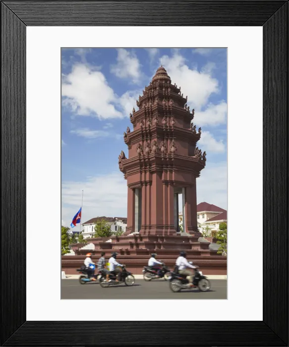 Framed Print : Motorcycles passing Independence Monument, Phnom Penh, Cambodia Framed Print : Motorcycles passing Independence Monument, Phnom Penh, Cambodia
