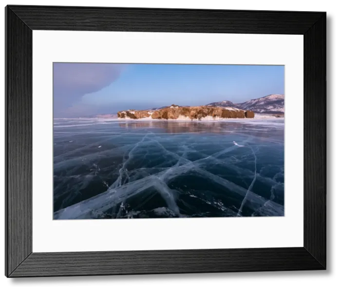 Framed Print : A flat ice with cracks of the lake Baikal, Cape Uyuga, Irkutsk region, Siberia, Russia Framed Print : A flat ice with cracks of the lake Baikal, Cape Uyuga, Irkutsk region, Siberia, Russia