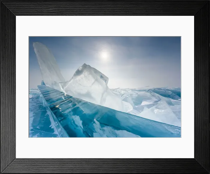 Framed Print : Pieces of transparent ice with sun reflection at lake Baikal, Irkutsk region, Siberia Framed Print : Pieces of transparent ice with sun reflection at lake Baikal, Irkutsk region, Siberia