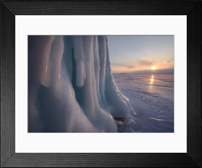 Framed Print : Ice stalactites in a cave at the shore at sunset at lake Baikal, Irkutsk region, Siberia Framed Print : Ice stalactites in a cave at the shore at sunset at lake Baikal, Irkutsk region, Siberia