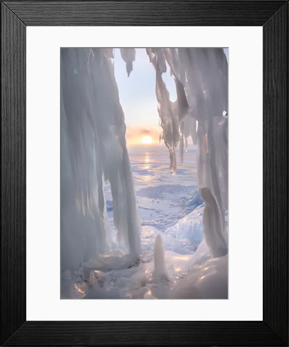 Framed Print : Ice stalactites in a cave at the shore at sunset at lake Baikal, Irkutsk region, Siberia Framed Print : Ice stalactites in a cave at the shore at sunset at lake Baikal, Irkutsk region, Siberia