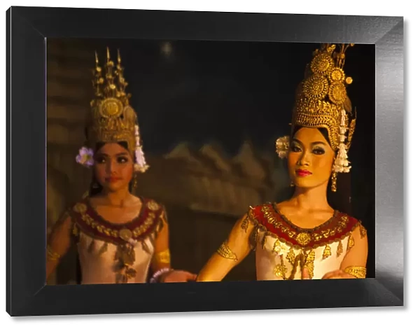 Cambodia, Siem Reap Province, Siem Reap. Traditional Apsara dancers giving an evening