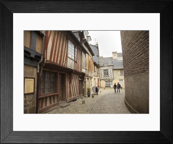 Framed Print : Rennes, France. Visitors enjoy the streets of Rennes historic quarter Framed Print : Rennes, France. Visitors enjoy the streets of Rennes historic quarter