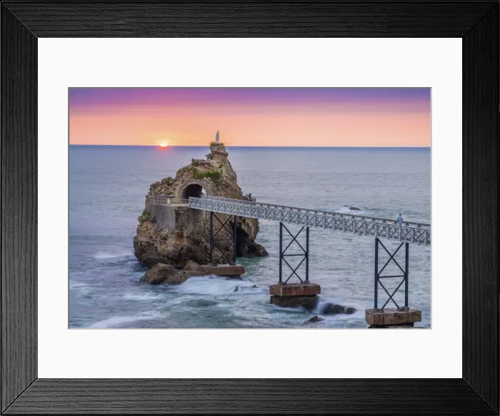 Framed Print : France, Aquitaine, Pyrenees Atlantiques, Biarritz. Rocher de la Vierge at sunset