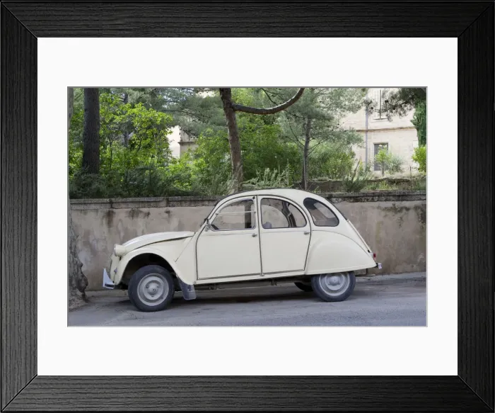 Framed Print : Provence, France. An old Citroen on the street in a small town in rural France