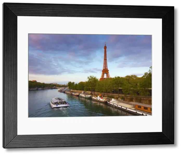 Framed Print : France, Paris, Eiffel Tower and tourist boat on River Seine Framed Print : France, Paris, Eiffel Tower and tourist boat on River Seine