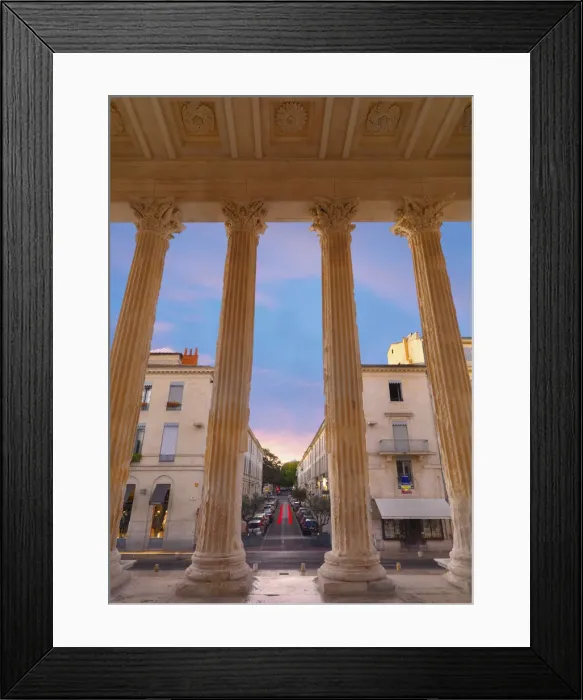 Framed Print : France, Provence, Nimes, Maison Caree, view through columns at dusk Framed Print : France, Provence, Nimes, Maison Caree, view through columns at dusk