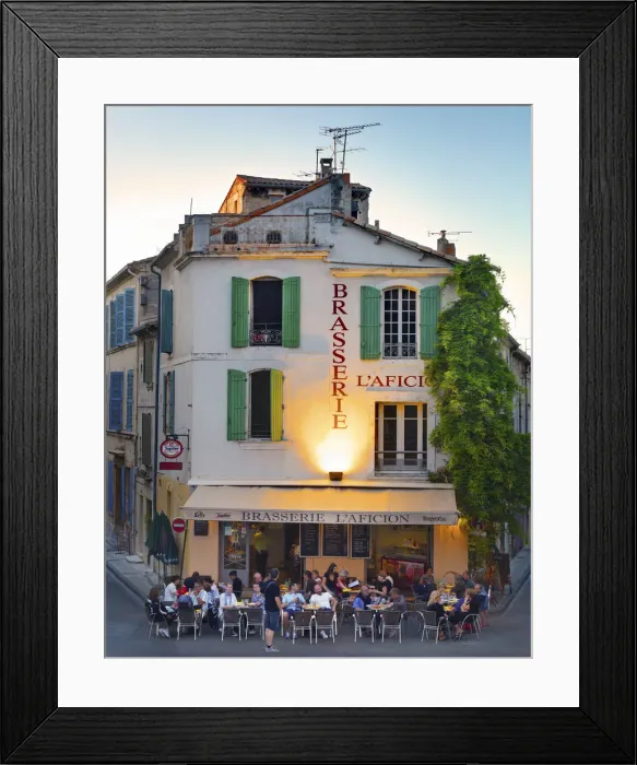 Framed Print : France, Provence, Arles, People at brasserie infront of Amphitheatre at dusk Framed Print : France, Provence, Arles, People at brasserie infront of Amphitheatre at dusk