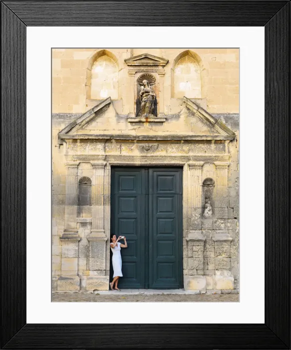 Framed Print : France, Provence, Arles, Notra Dame de la Major, Woman taking photograph in church Framed Print : France, Provence, Arles, Notra Dame de la Major, Woman taking photograph in church