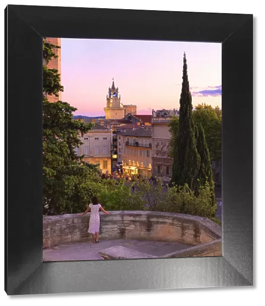 France, Provence, Avignon, Woman looking towards Town hall MR