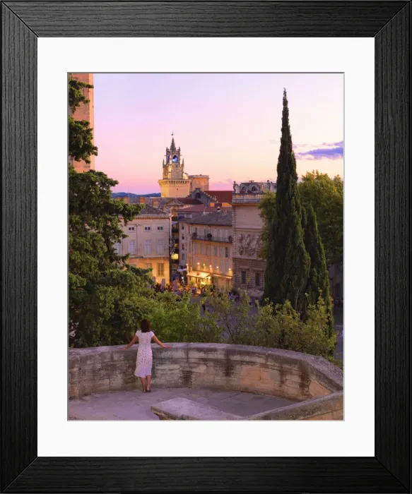Framed Print : France, Provence, Avignon, Woman looking towards Town hall MR Framed Print : France, Provence, Avignon, Woman looking towards Town hall MR