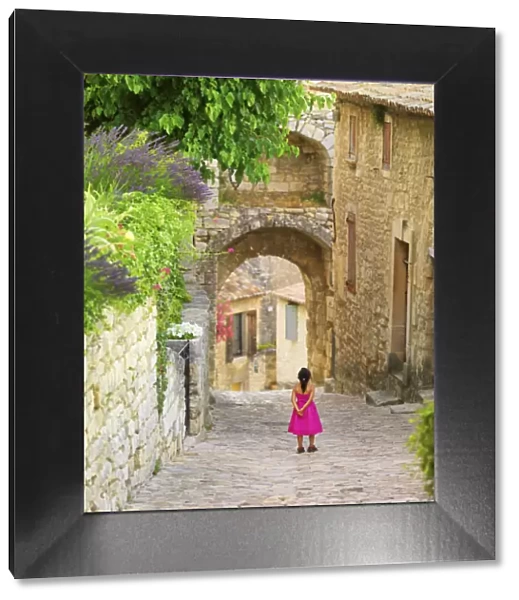 France, Provence, Lacoste, view along cobbled street in village (MR)