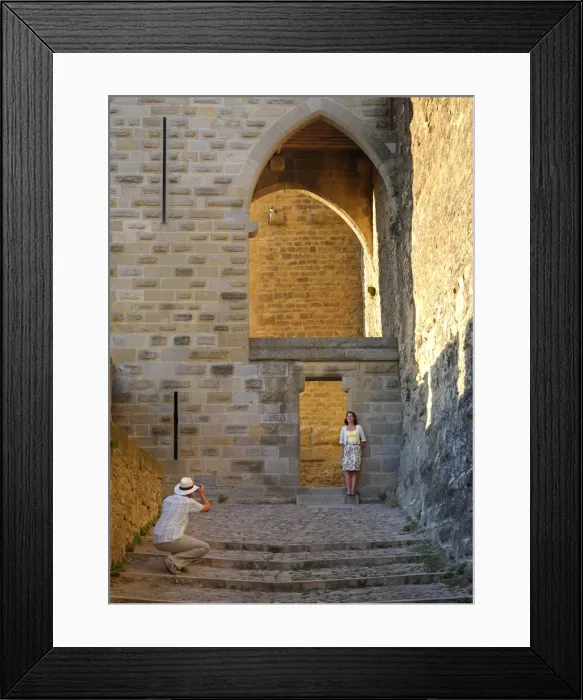 Framed Print : France, Languedoc, Carcassonne, Man photographing woman (MR) Framed Print : France, Languedoc, Carcassonne, Man photographing woman (MR)