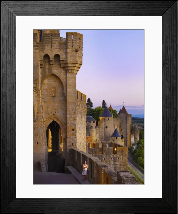 Framed Print : France, Languedoc, Carcassonne, Woman looking at view from walls at dusk (MR) Framed Print : France, Languedoc, Carcassonne, Woman looking at view from walls at dusk (MR)